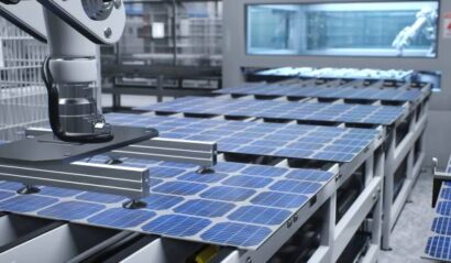 Focus on solar panels on conveyor belts with robotic arms operating in industrial factory, 3D illustration. PV cells being moved around facility using production lines, close up shot